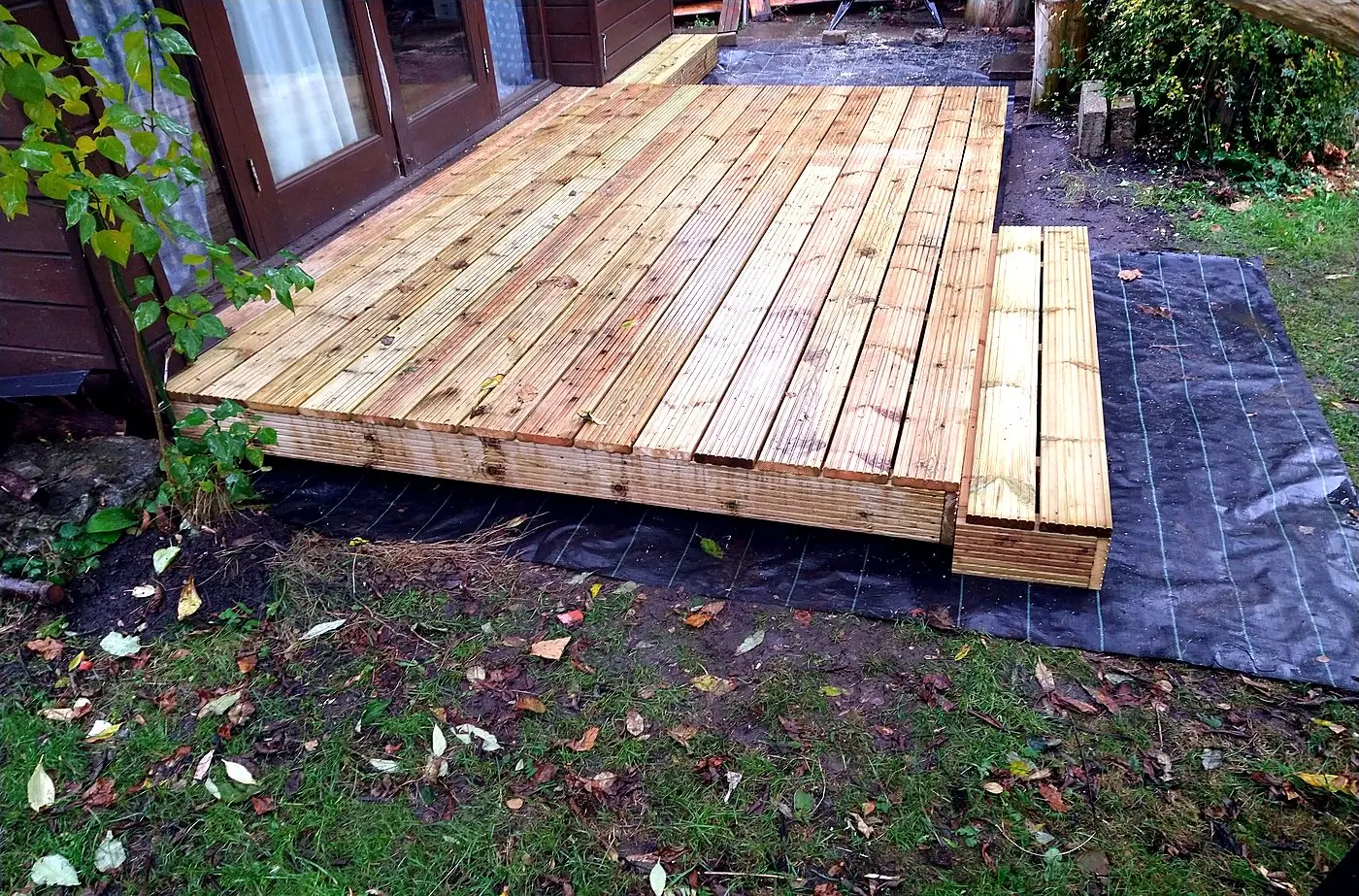 Newly built timber deck and step outside a garden building
